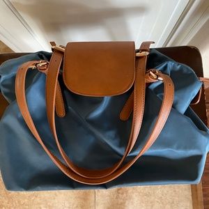 M/L Mystique blue nylon with stripes interior.